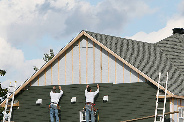 Professional Siding Replacement technician working in Providence Forge, VA